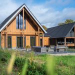 Afbeelding Houten huis met veranda